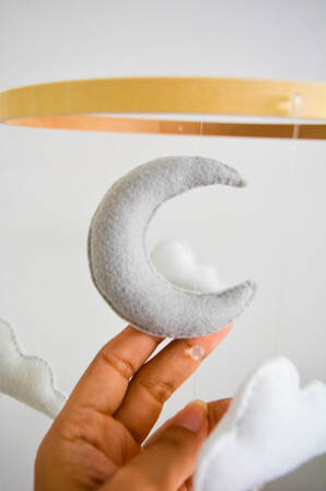 Gray stuffed crescent moon